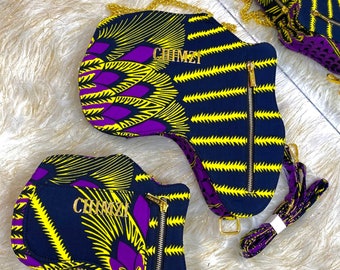 May include: Two black and yellow patterned handbags with gold zippers and gold chains. The handbags have the word "CHIMZI" written in gold letters on the front.