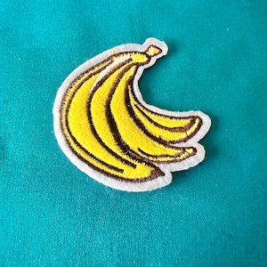 Remendos de banana - Cacho de bananas Remendo de ferro - Remendo de ferro em banana - Remendos de ferro