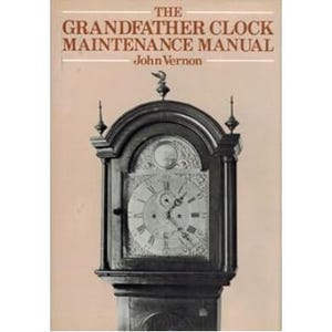 May include: The Grandfather Clock Maintenance Manual book cover features a black grandfather clock with a white face and Roman numeral hour markers. The book title is "The Grandfather Clock Maintenance Manual" with the author's name "John Vernon" below.
