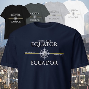May include: A navy blue t-shirt with a compass graphic and the text "I crossed the equator 00° 00' 00" N 00° 00' 00" S Ecuador".