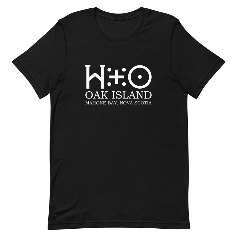 May include: Black t-shirt with a white graphic of the Oak Island symbol, "W:O", and the text "Oak Island, Mahone Bay, Nova Scotia."