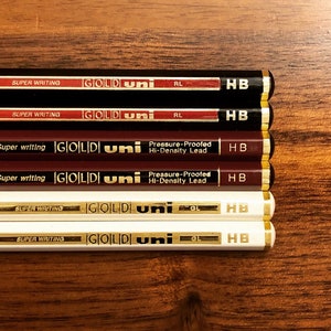Mitsubishi &quot;Super Writing&quot; Gold Uni Collection: Set of 6 Pencils in White, Maroon and Black
