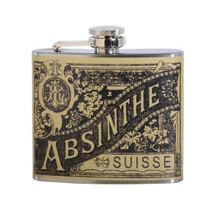 May include: A silver flask with a black and white design featuring the text "ABSINTHE SUISSE".