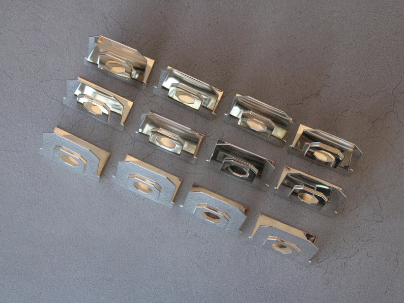 12 silver-plated placeholder mounts