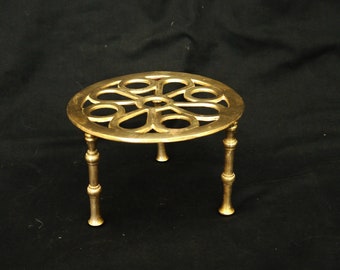 vintage  brass trivet circle shaped  on the feet  brass solid base stand to flower pot or hot kettle decorative large trivet  shaped fowers