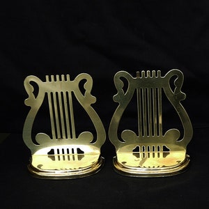 vintage brass bookends in the shape of a harp set brass book ends a musical instrument harps solid bookend heavy