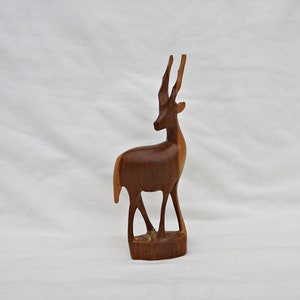 hand carved wooden antelope vintage carved African animal antelope teak sculpture wood animal antelope statue natural wood animal African