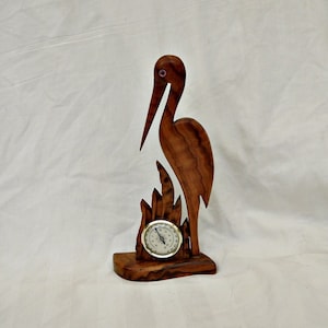 hand carved wooden bird heron with home  thermometer vintage thermometer with wood carved bird heron on stand bird figure olive tree