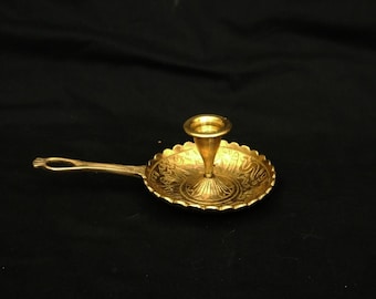 vintage solid brass chamber stick with handle brass candle holder ornate etched Egyptian symbols old Egiptian chamberstick