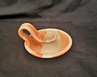 Vintage stoneware chamberstick with handle stamped  Willie Winkle candle holder
