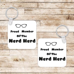 Proud Member of the Nerd Herd Keyring - Geek Gift - Funny Nerd Keychain - Glasses Key Fob - Geeky Accessory