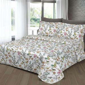 Sateen comforter. Italian bedding. Quilt for cold weather. Colorful design with birds and flowers. Made in Italy