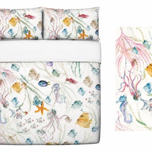 May include: A white bedding set featuring a watercolor print of various marine life including seahorses, jellyfish, starfish, and colorful tropical fish swimming among seaweed. The set includes two rectangular pillowcases and a large duvet cover.