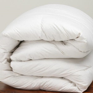 Inner duvet in hypoallergenic polyester fiber. White down duvet. Warm duvet insert. Made in Italy