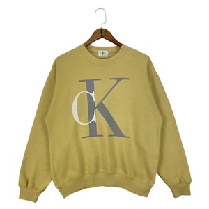 Vintage 90s Calvin Klein Crewneck Sweatshirt Made In USA Yellow Pullover Jumper Size S
