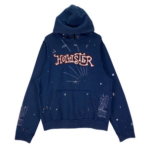 Vintage Hollister Ripped Painted Hoodie  Sweater Grey Big Logo Made In Pakistan Pullover Jumper Size XL