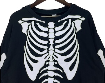 H&m skull sweater hotsell