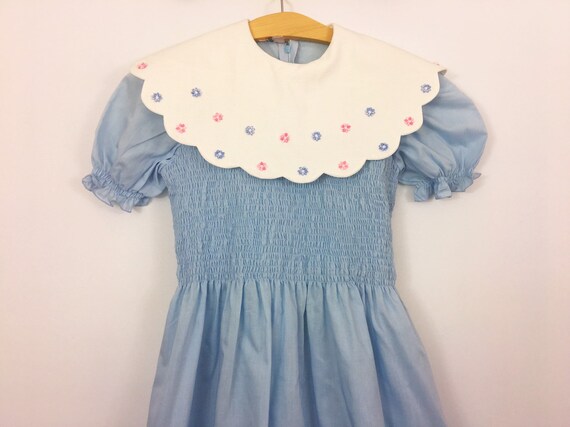 Vintage 1980's girls blue white floral smocked puf