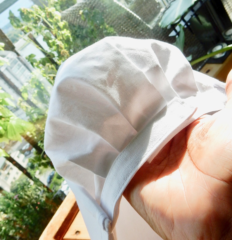 PREORDER Candice White Handsmocked Bonnet (SHIPS MAY) main image 1