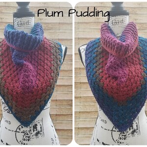 May include: Two crocheted neck warmers in a triangular shape with a color gradient of teal, brown, pink, and purple. The neck warmers are displayed on a white mannequin.