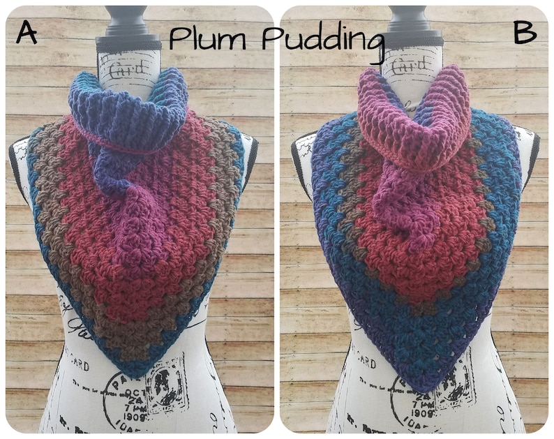 May include: Two crocheted neck warmers in a triangular shape with a color gradient of teal, brown, pink, and purple. The neck warmers are displayed on a white mannequin.