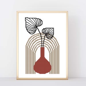 May include: A cross-stitch pattern featuring a stylized plant in a terracotta vase with a brown and beige striped background.