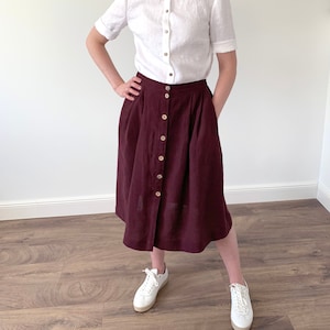 Linen loose midi skirt with light brown wooden buttons and elastic waistband, comfortable washed linen mid-calf skirt with pockets