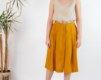 Linen mustard yellow midi skirt with light brown hidden wooden buttons and elastic waistband,  washed linen mid-calf skirt with pockets