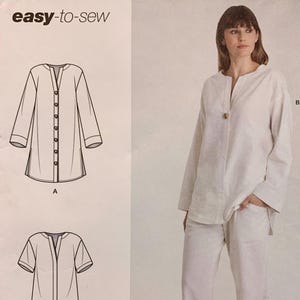 Peut inclure: Patron de couture Simplicity S9113 pour un haut et un pantalon faciles à coudre. L'enveloppe du patron présente des dessins techniques d'une tunique boutonnée à manches longues et d'un haut à manches courtes, ainsi qu'une photo de la tenue crème.