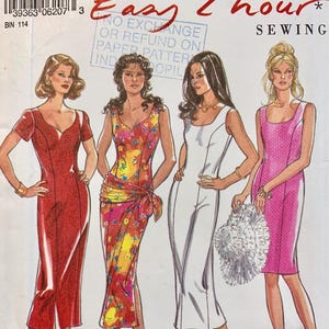 May include: New Look sewing pattern 6207 for sizes 6-16, featuring illustrations of four dress variations. The designs include a solid red dress, a floral print dress with a waist tie, a solid white dress, and a pink polka dot dress with a scoop neckline.