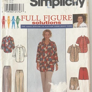 May include: A Simplicity sewing pattern envelope, number 8173, size GG 26W-32W, titled Full Figure Solutions by Mary Duffy. The cover features illustrations and a photograph of a button-down shirt with a geometric pattern and matching trousers or shorts.