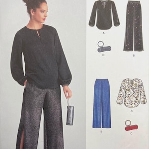 May include: New Look sewing pattern K6582 size A U.S. 10-18 featuring a long-sleeve blouse with a keyhole neckline, wide-leg trousers with side slits, and a small wristlet pouch. The pattern includes variations for solid and floral fabrics.