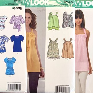 May include: Three New Look sewing pattern envelopes labelled 6025, 6245, and 6806. Each envelope displays illustrations of various top and dress designs, including short-sleeved shirts, sleeveless tunics, and sundresses in diverse colours and patterns.
