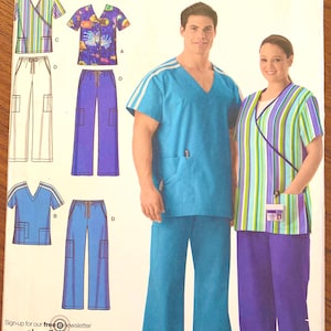 May include: Simplicity easy-to-sew pattern 4101. The pattern features scrubs with a V-neck top and cargo trousers. The scrubs are shown in various colours and patterns, including stripes and solid colours. The pattern includes sizes AA S, M, and L.