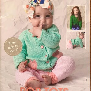 May include: A baby in a mint green cardigan and pink trousers, featured on a knitting pattern book cover. The book is titled "POP TOTS" and includes the text "From baby to size 4!". The Patons logo is visible in the upper right corner.
