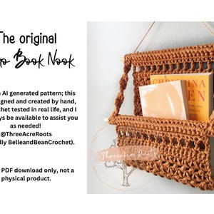 May include: A rust-colored crochet wall hanging featuring a pocket design suspended from a wooden dowel. The piece includes an open-weave pattern and holds two books. Text on the image reads: The original Boho Book Nook, ThreeAcreRoots.