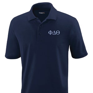 May include: A navy blue polo shirt with a white embroidered Greek letter design that reads "ΦΔΘ".