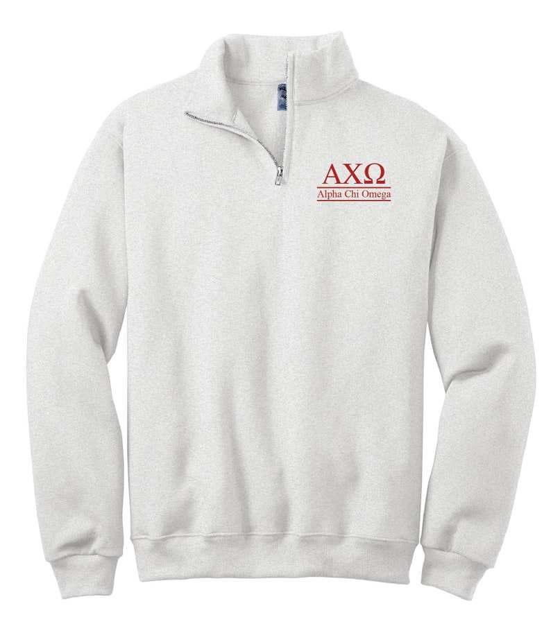 May include: A white 1/4 zip sweatshirt with a red embroidered logo that says "AXO Alpha Chi Omega".