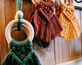 Handgemaakte macramé-olieverspreiders