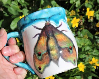 Hand made hand painted ceramic butterfly mug with drippy blue glaze, moth mug, butterfly mug, butterfly present, nature present, butterflies