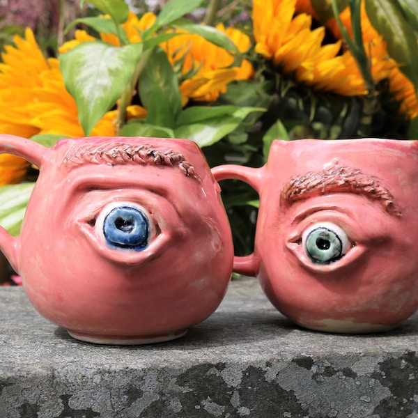 Hand sculpted ceramic eye mug with heavy textured surface, pink eye, eyeball, horror mug, fantasy mug, eyeball mug, face mug, eye sculpture