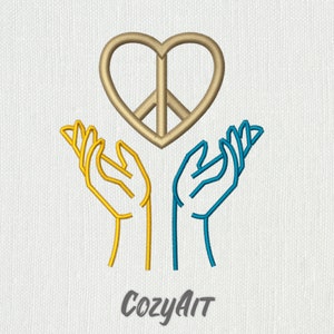 Puede incluir: Diseño bordado con un símbolo de paz dorado en forma de corazón sobre dos manos estilizadas. Una mano es amarilla, la otra azul. El texto "CozyArt" está en la parte inferior.