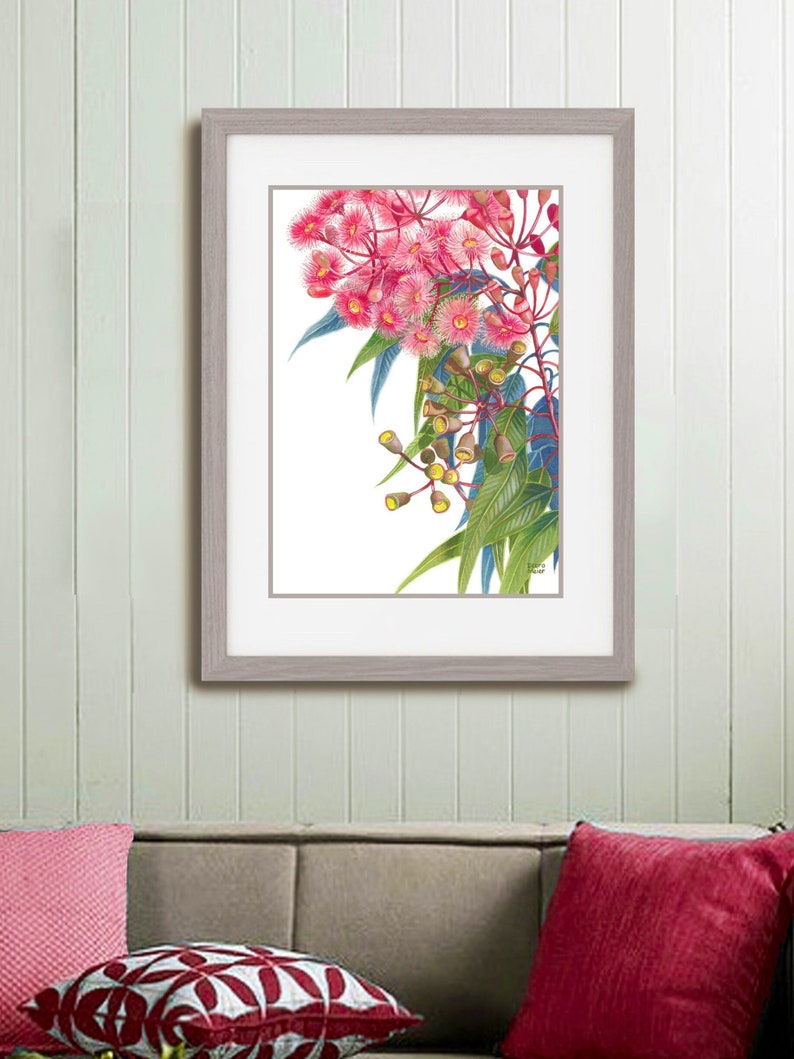 May include: A framed botanical illustration of pink and yellow flowers with green leaves on a white background.