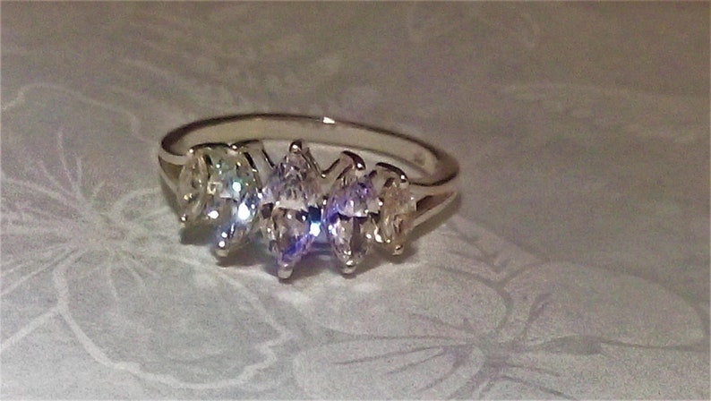 marquise cut stones solid sterling silver diamond ring 2.50 cts gift boxed. excellent clarity and sparkle lab createdsimulated,
