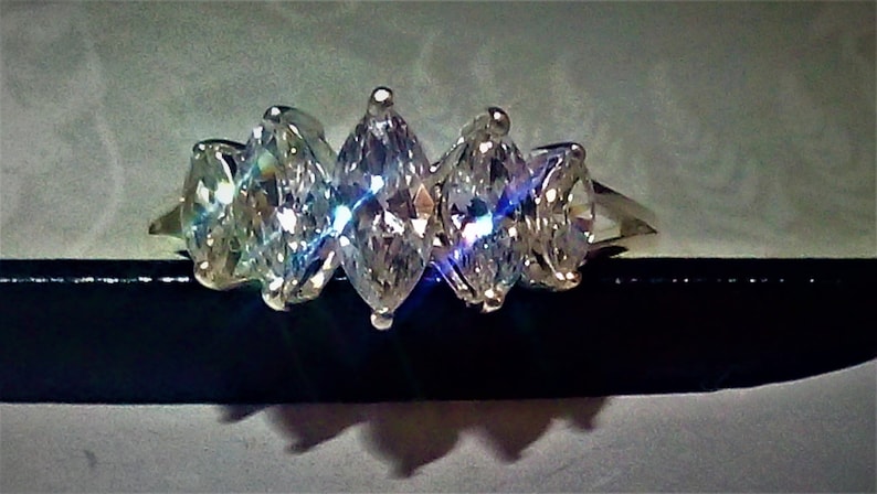 marquise cut stones solid sterling silver diamond ring 2.50 cts gift boxed. excellent clarity and sparkle lab createdsimulated,