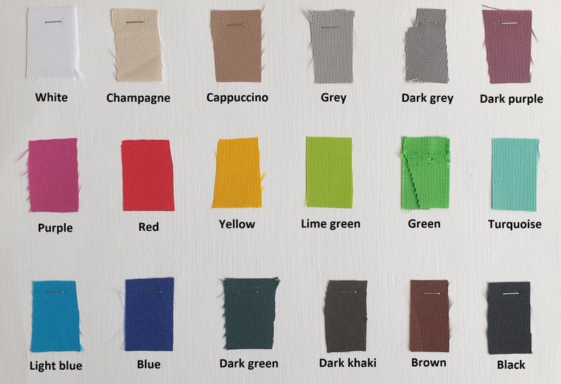 May include: A color chart of fabric swatches in various colors, including white, champagne, cappuccino, grey, dark grey, dark purple, purple, red, yellow, lime green, green, turquoise, light blue, blue, dark green, dark khaki, brown, and black.
