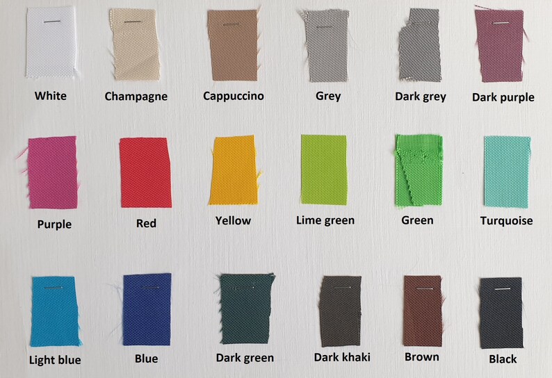 May include: A color chart of fabric swatches in various colors, including white, champagne, cappuccino, grey, dark grey, dark purple, purple, red, yellow, lime green, green, turquoise, light blue, blue, dark green, dark khaki, brown, and black.