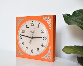 Mid Century Plastic Wall Clock by INSA / Vintage Orange Clock / Made in Yugoslavia / 70s