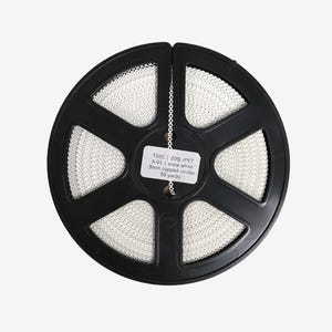 May include: A black plastic spool wound with snow white 3mm cupped circles trim. A central white label reads: TSSC | 20% rPET A-01 | snow white 3mm cupped circles 50 yards. The trim is arranged in a circular pattern around the central hub.