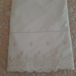 Antique bed linen, bed sheet embroidered with flowers, vintage French linen.